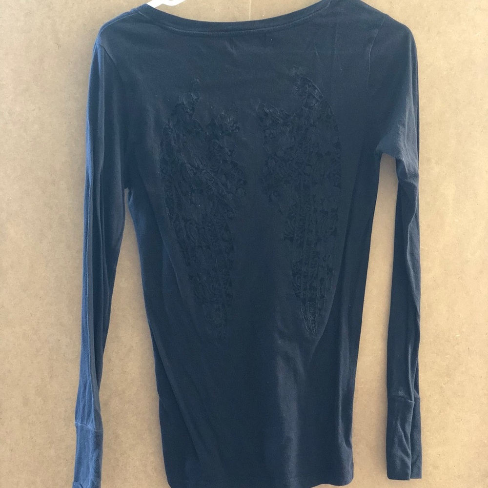 Nollie black long sleeve shirt with angel wings